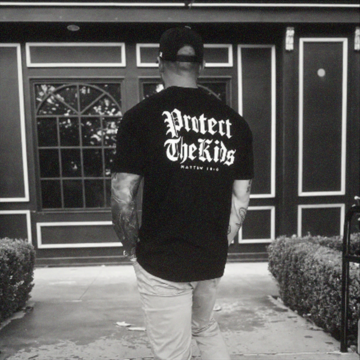 VC community member wearing Protect The Kids — grainy black and white photo