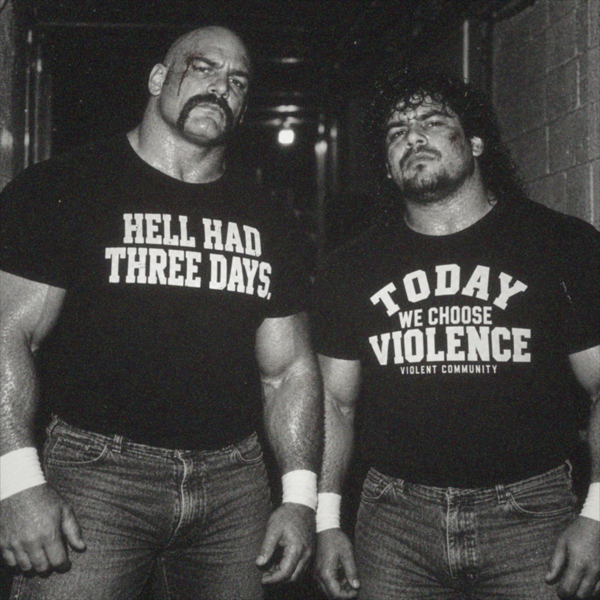 Tag team wearing Hell Had Three Days and Today We Choose Violence tees