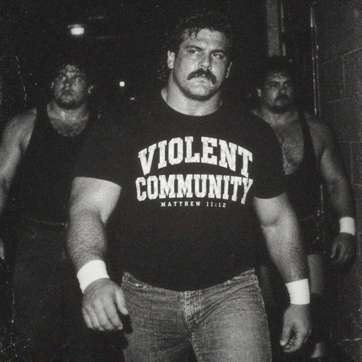 Wrestling crew with Violent Community Matthew 11:12 shirt